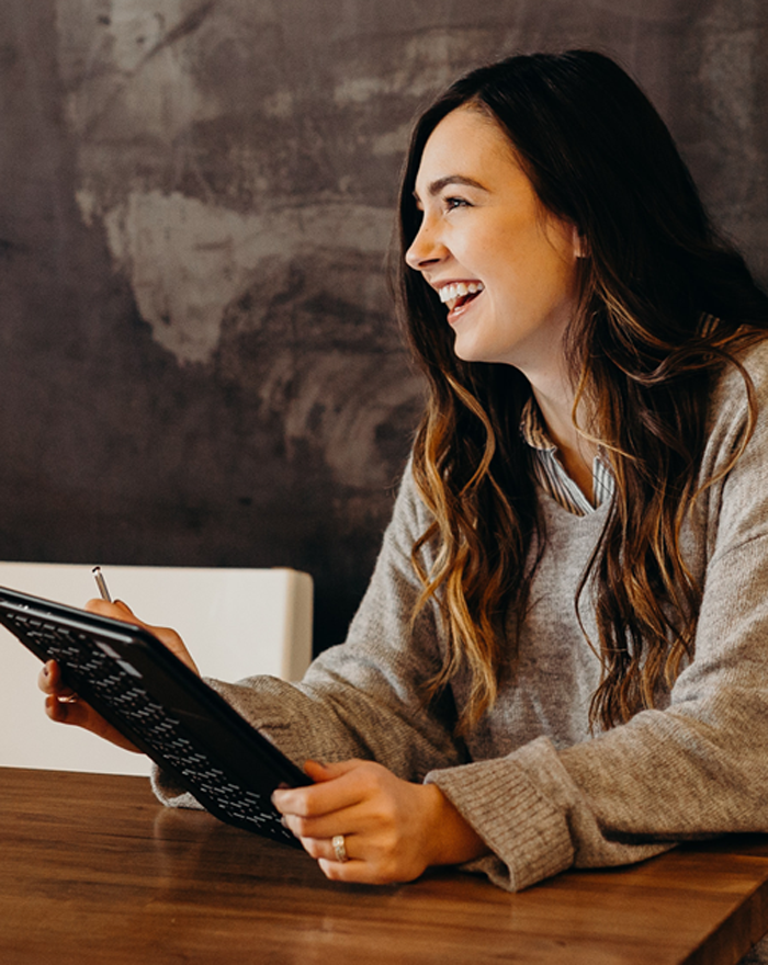 smiling woman preparing for an interview