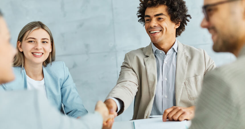 smiling professional seals the deal