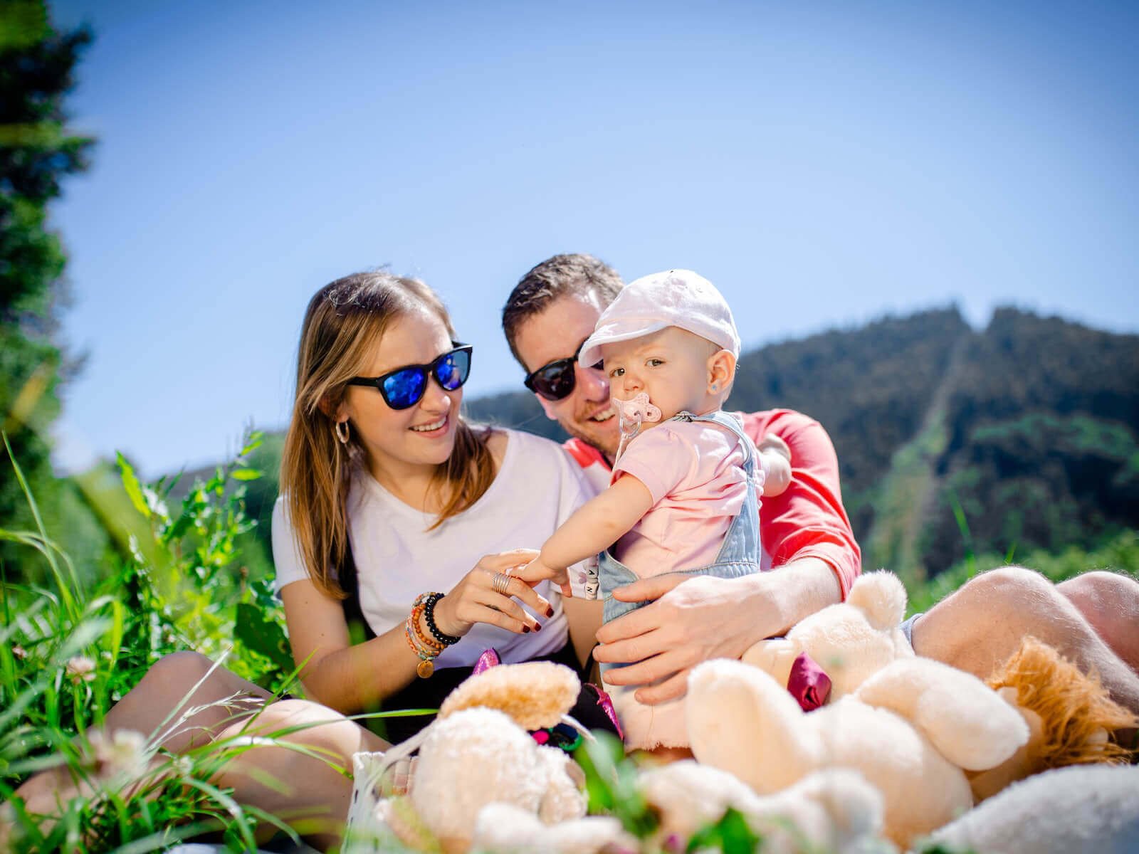 happy family enjoying outdoor picnic