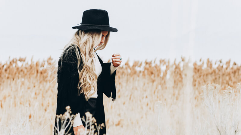 fashionable woman in field