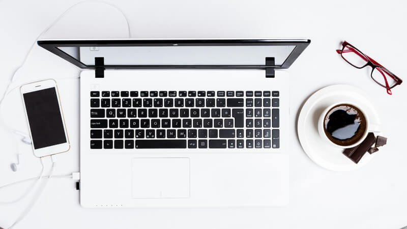 top-down view of laptop workspace
